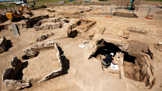 Among the many tombs in the necropolis, the team also found a small rectangular altar (left) that once held a jar containing cremated remains, and impressive tomb (right) filled with artifacts, including a pair of silver hands, that likely belonged to an Etruscan noble family. (Marco Merola)