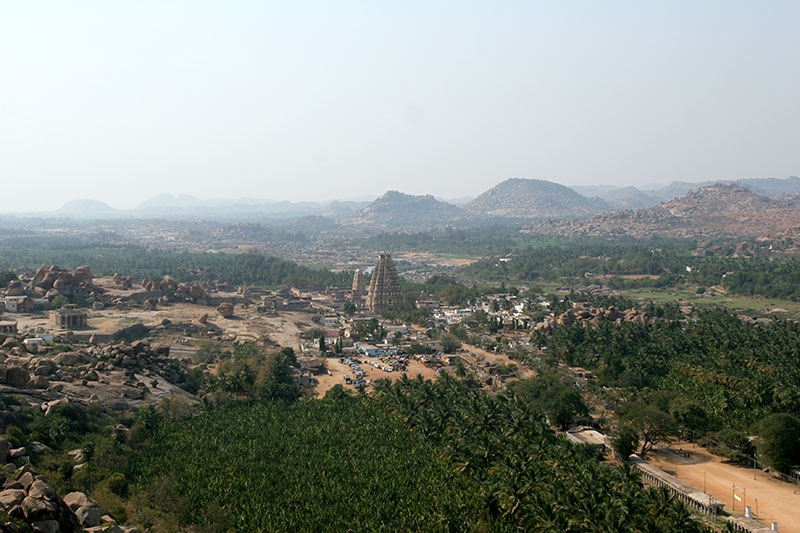 The Sacred Center of Hampi, including Virupaksha Temple (at center) and Hampi Bazaar (stretching to the right), as seen from the top of Matanga Hill 
