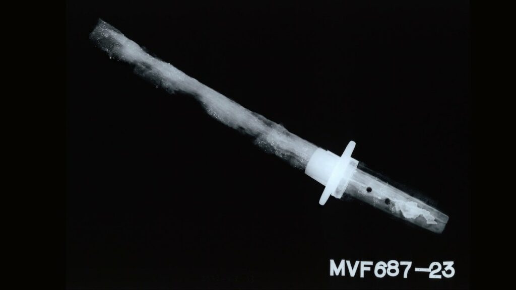 X-ray of wakizashi sword showing two visible holes in the tang for attaching the wooden handle