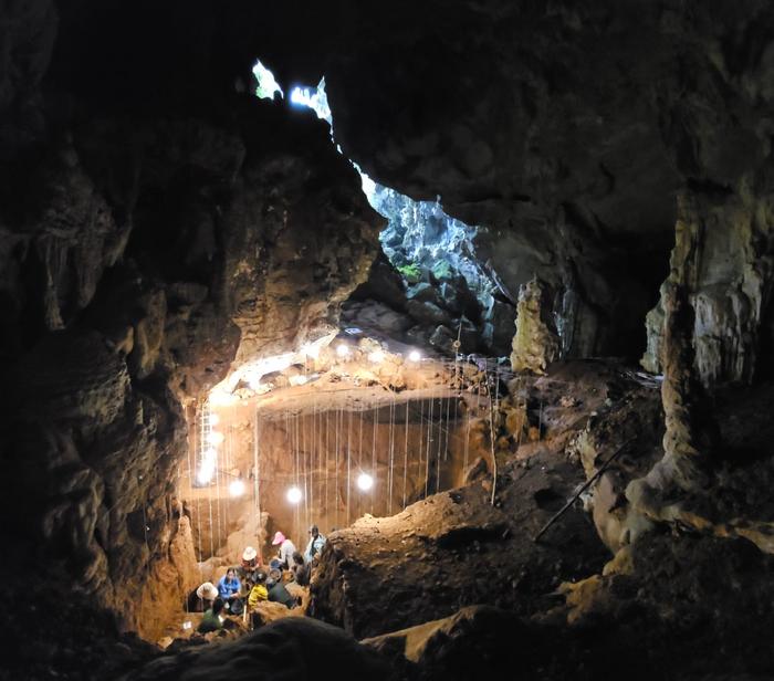 Local archaeologists excavating in Tam Pà Ling Cave, Laos