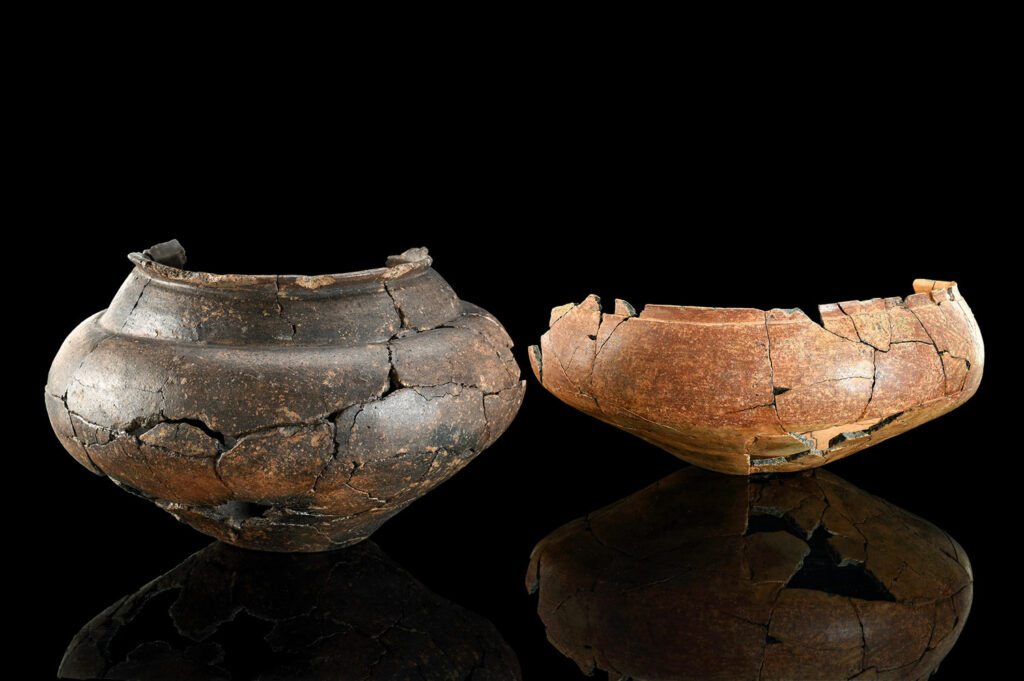 Ceramic vessels found in a pit under the burial mound served as urns