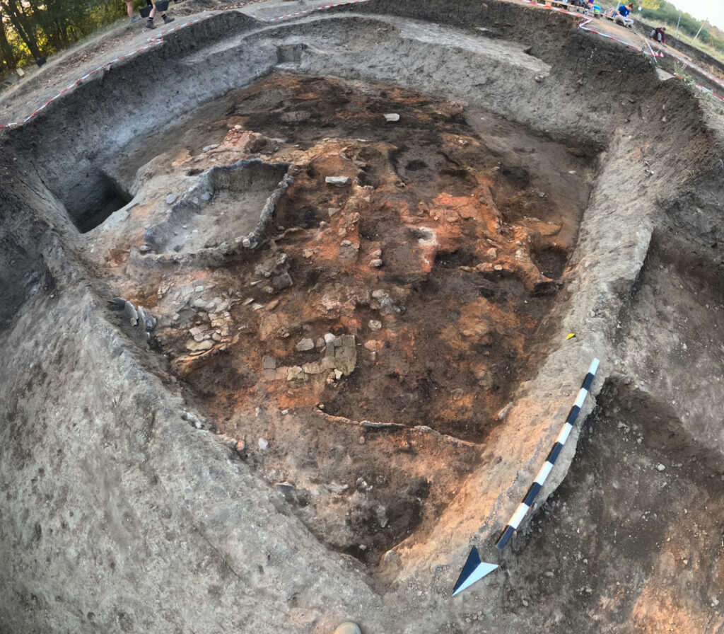 Rectangular burnt house with remains of built installations and vessels for food storage, Svinjaricka Cuka, Serbia