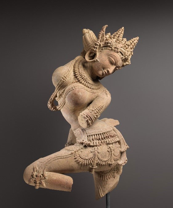 Sandstone sculpture of a celestial dancer