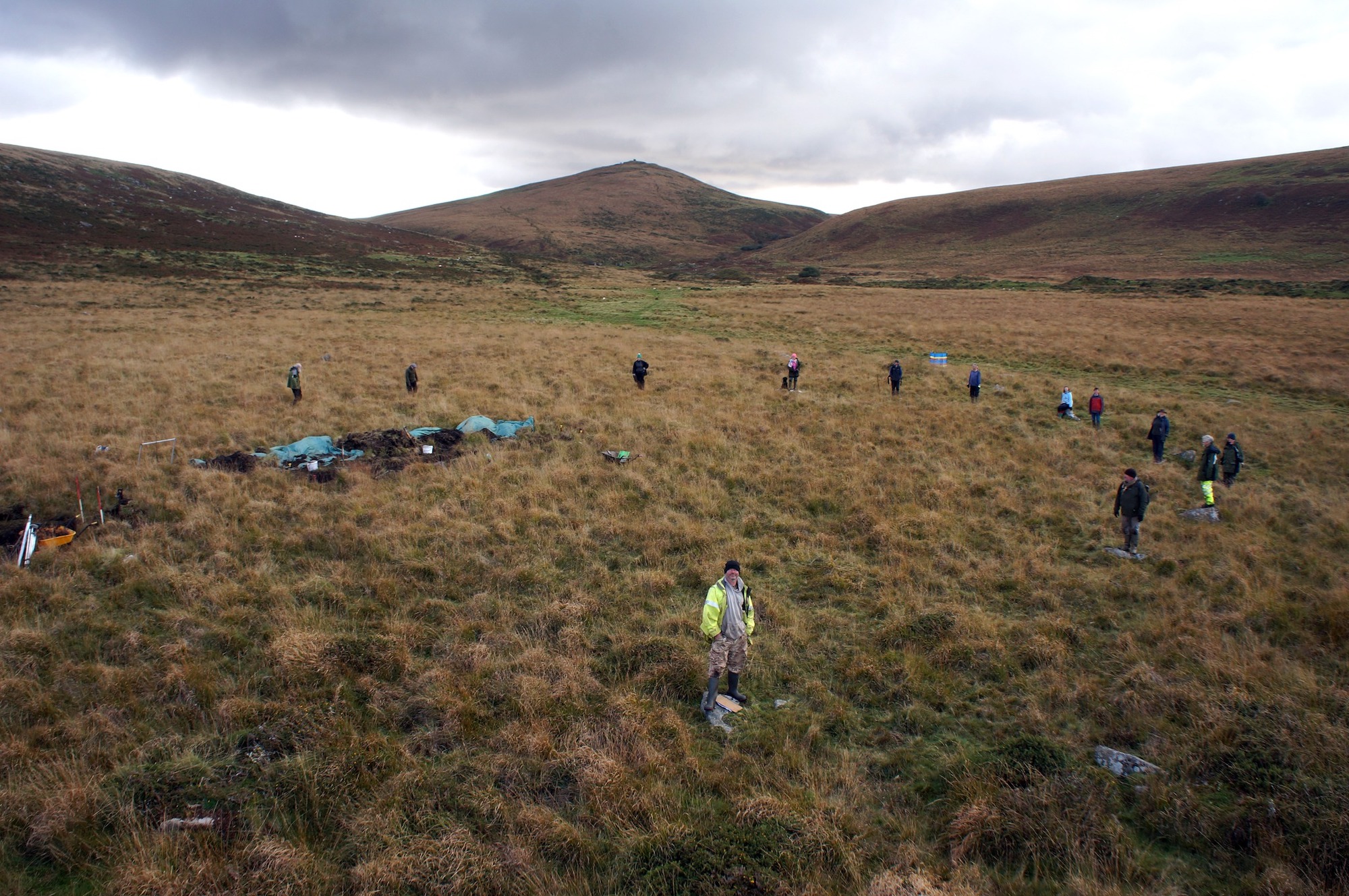 Volunteers mark the positions of stones in the Metheral Circle, Dartmoor, England