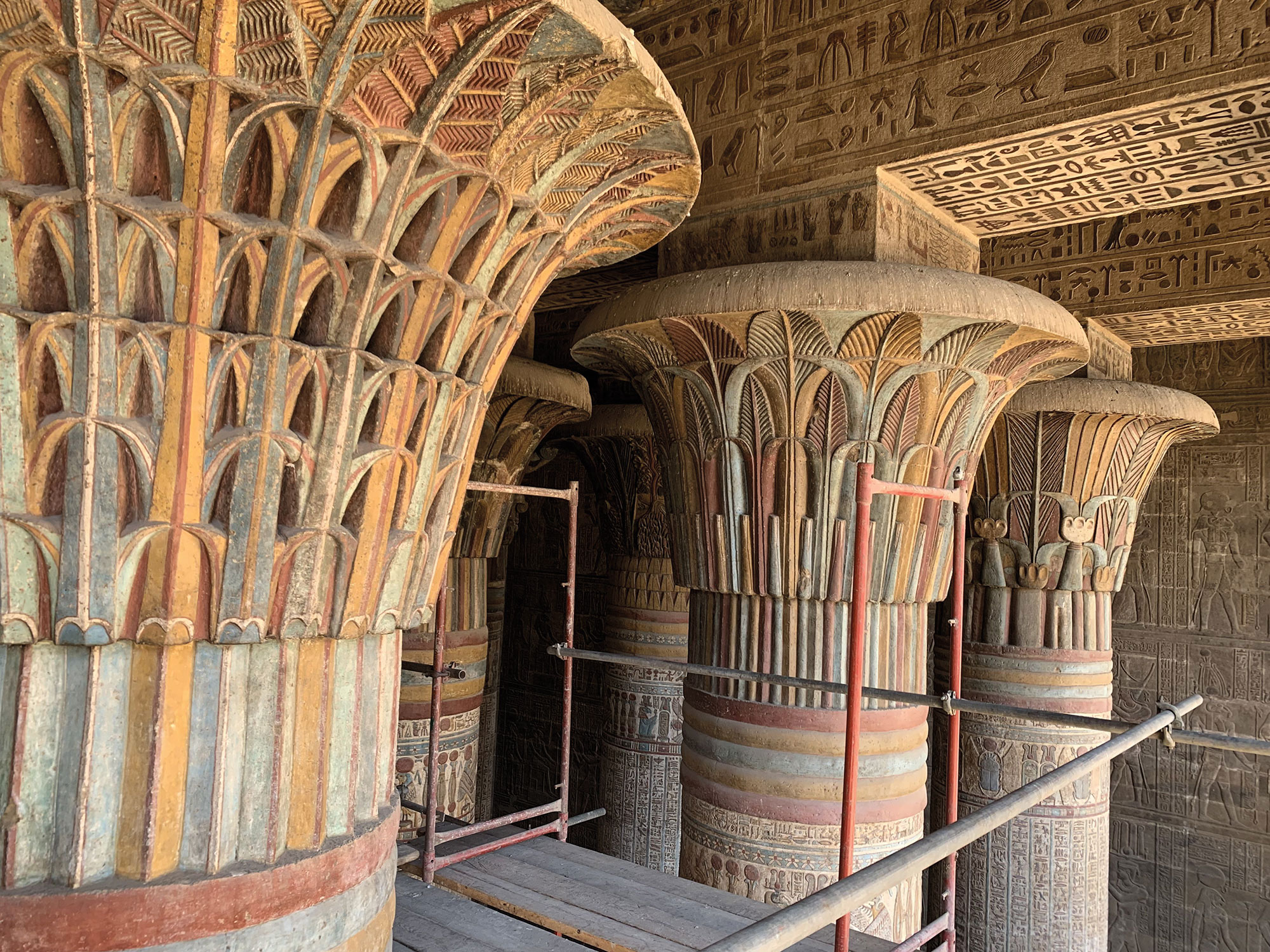 Painted lotus-leaf capitals after cleaning in the entrance hall of the temple of Khnum, Esna, Egypt