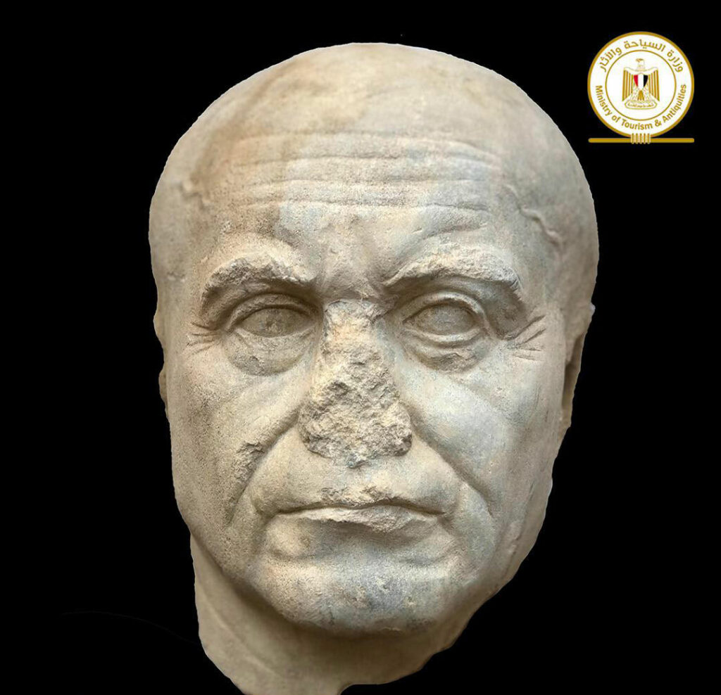 Marble statue head depicting an elderly man from Taposiris Magna, Egypt