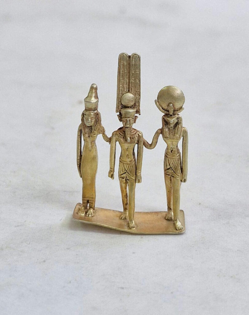 Statuette depicting Amun, Mut, and Khonsu