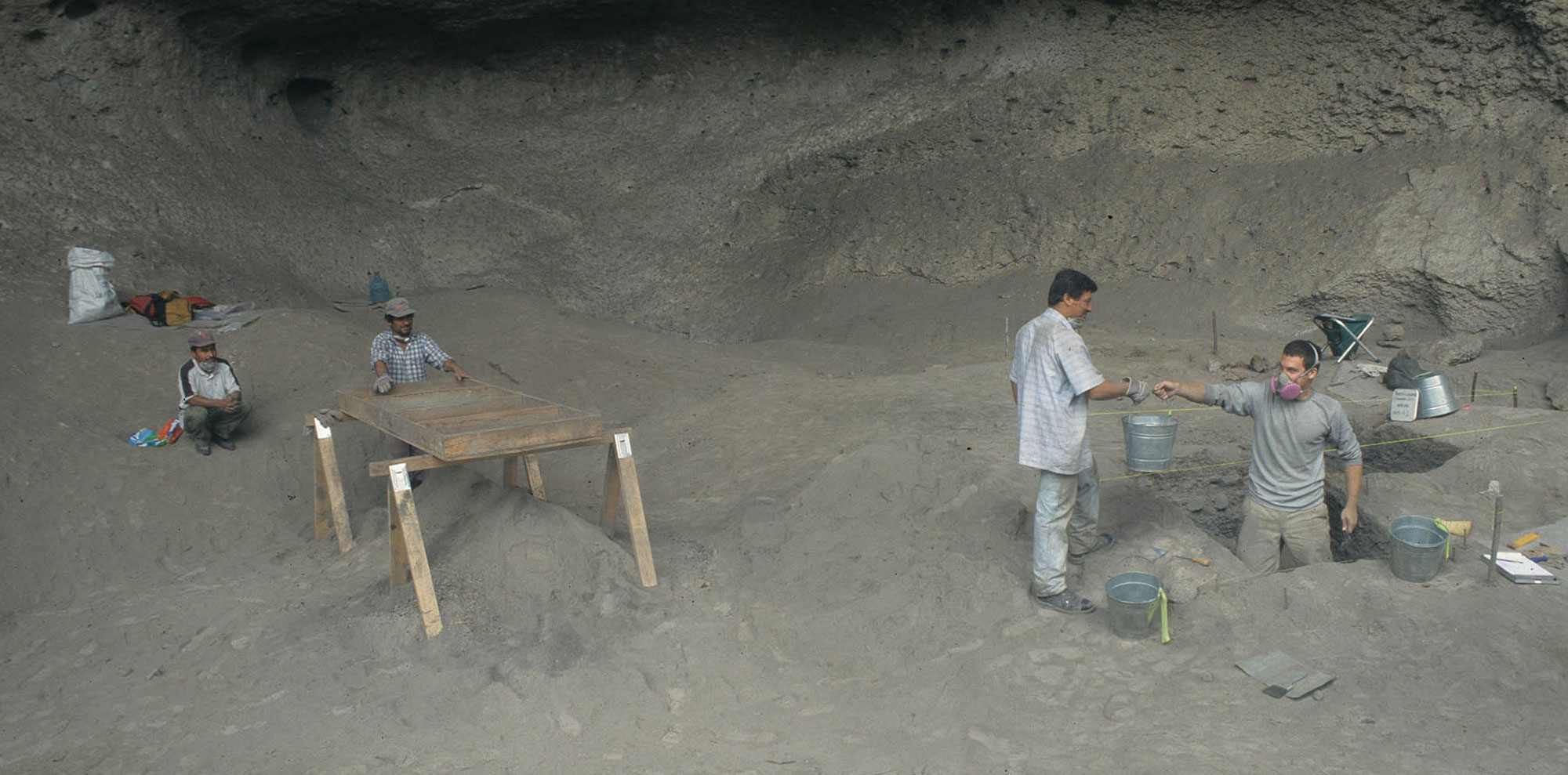 Archaeologists excavating a cave, El Gigante Rockshelter, Honduras