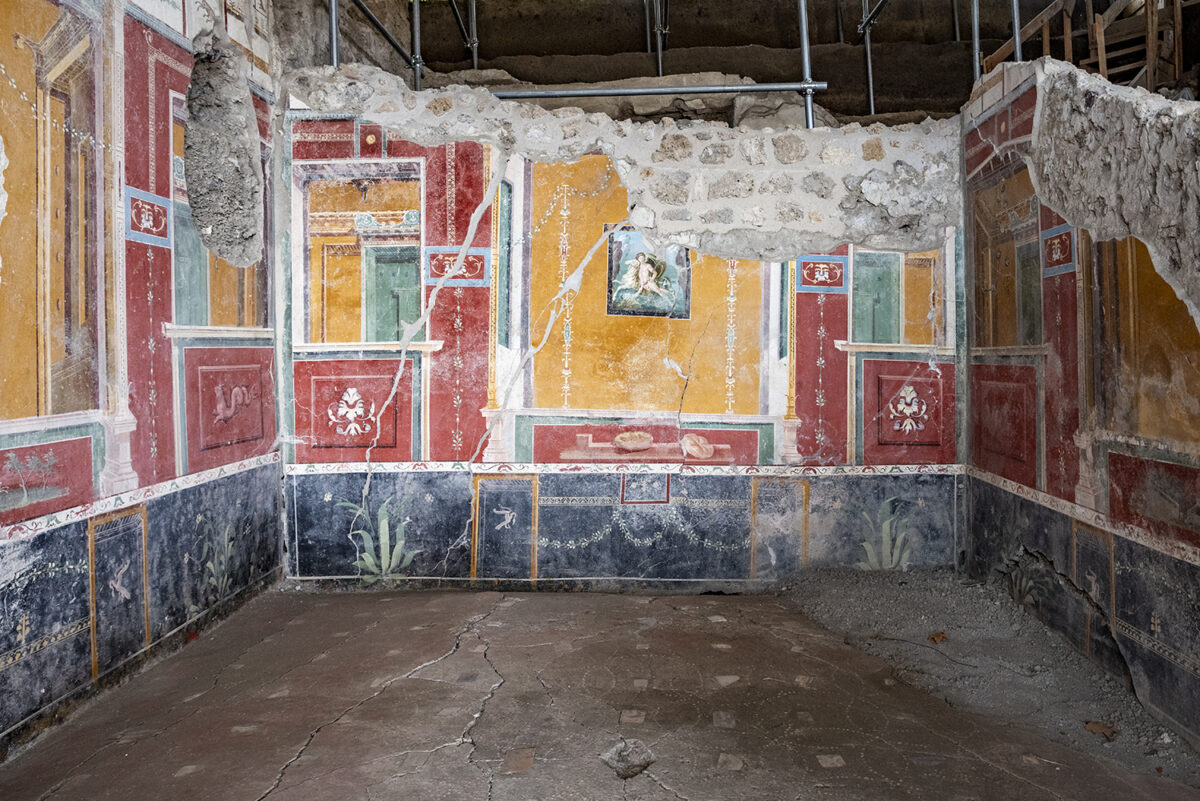 Room adorned with wall paintings inside the House of Helle and Phrixus, Pompeii, Italy