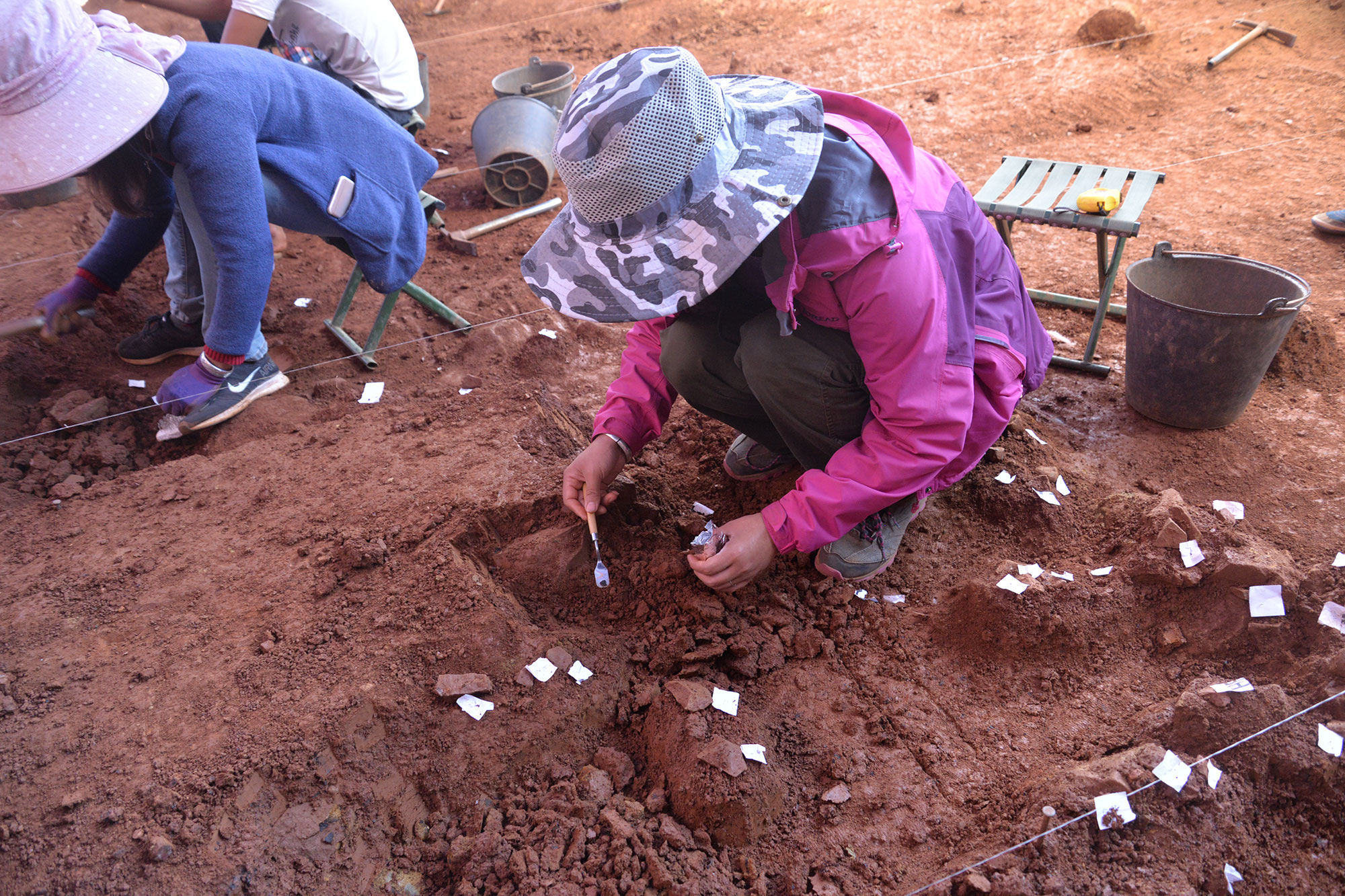 Archaeologists excavate at Longtan, China