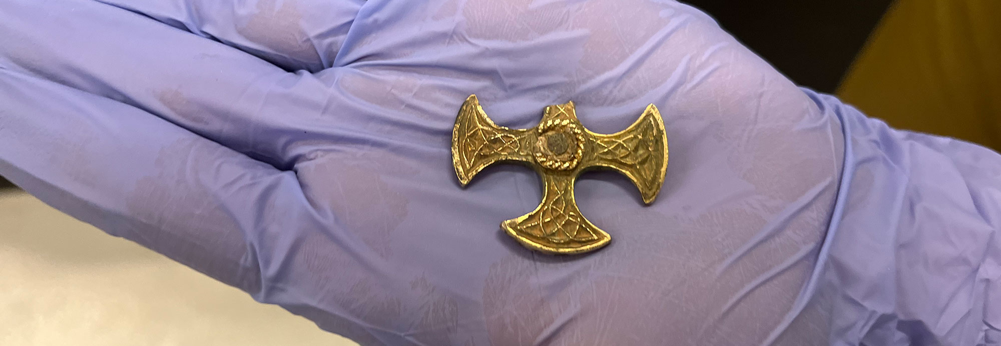 Gilded cross pectoral