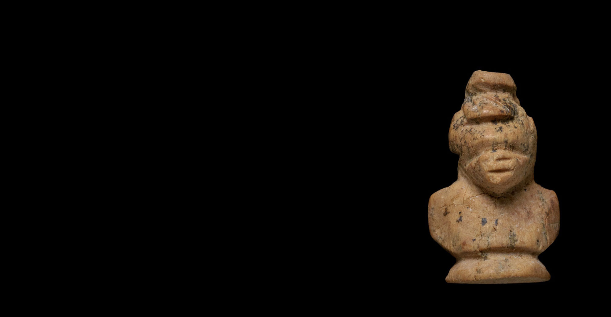 Carved head of African figure