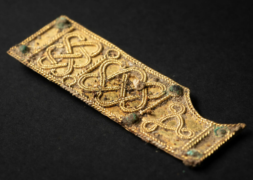 Gold sword fitting
