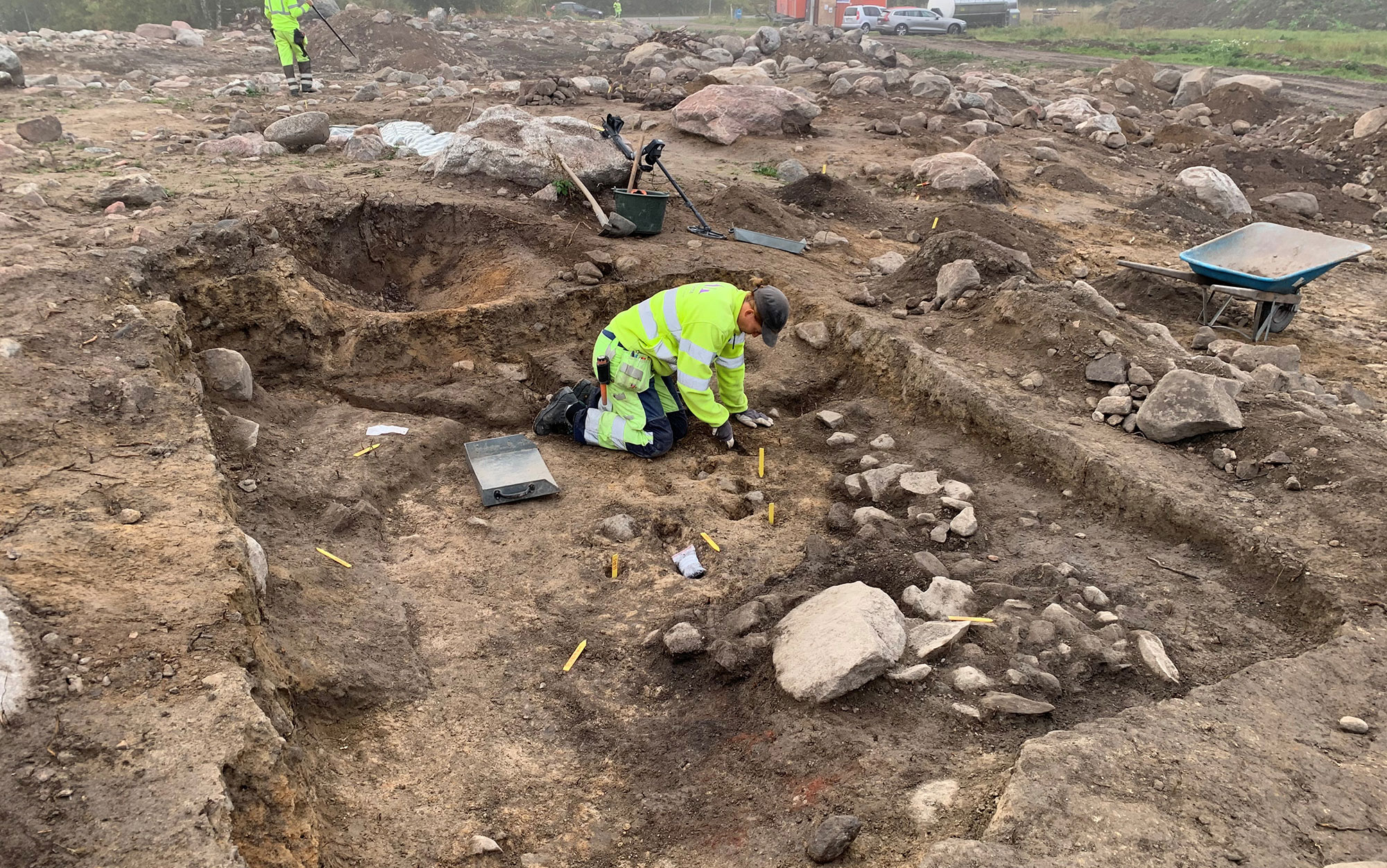 An archaaeologist excavates a house, Täby, Sweden