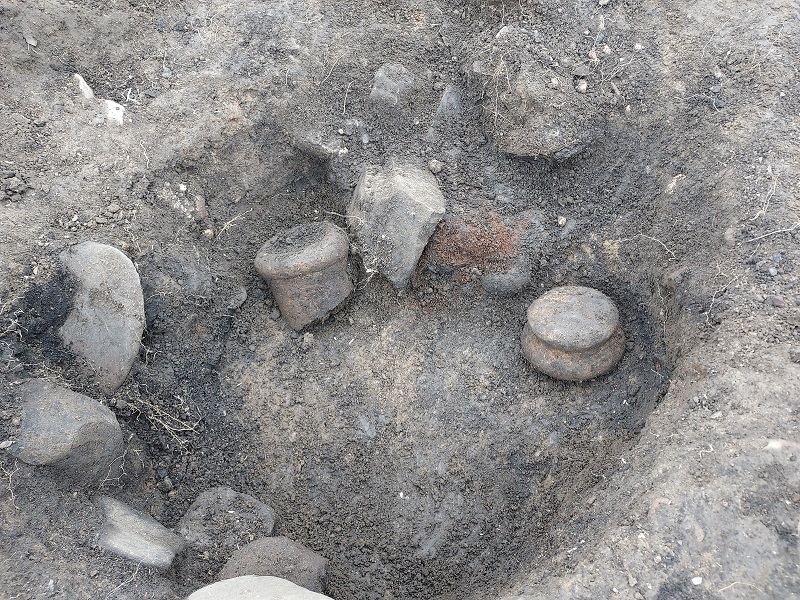 Intact Roman pot (at right) in excavation pit, Drumanagh, Ireland