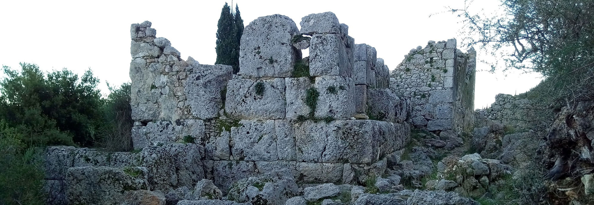 Landscape shot with Hellenistic stone tower, Agios Athanasios, Greece