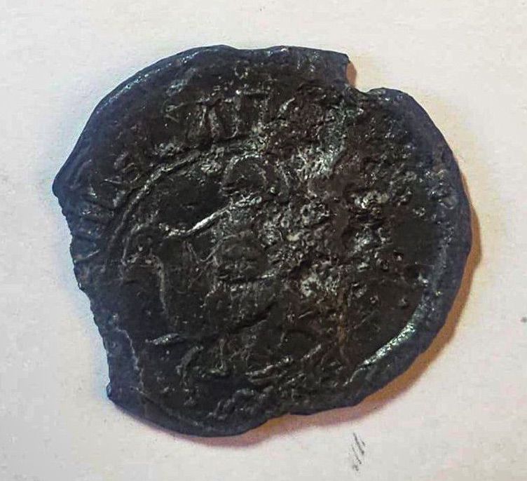 Other side of lead seal with image of St. George the Victorious