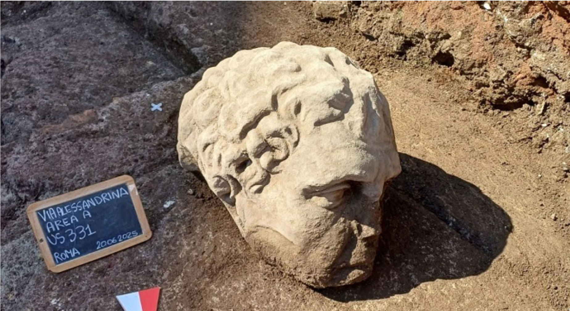 Roman marble head unearthed in Via Alessandrina, Rome, Italy
