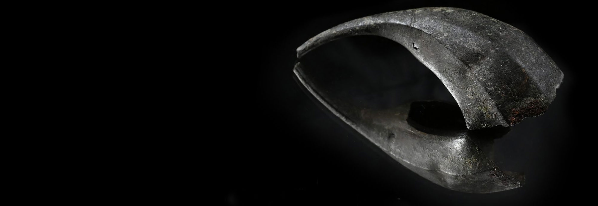 Fragment of Roman bronze coin purse
