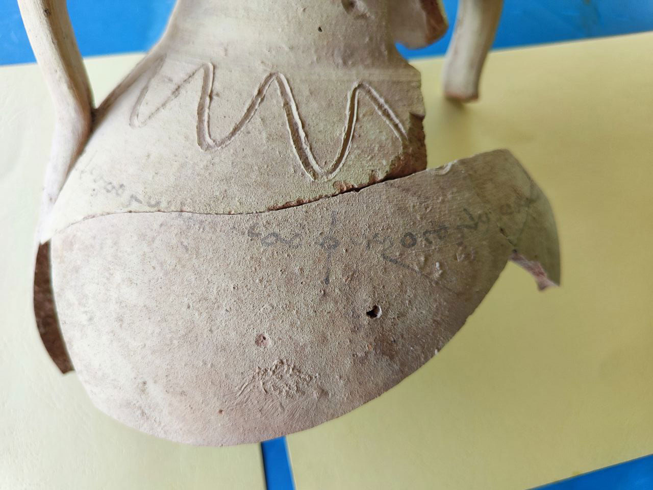 Detail showing Bactrian inscription on jug