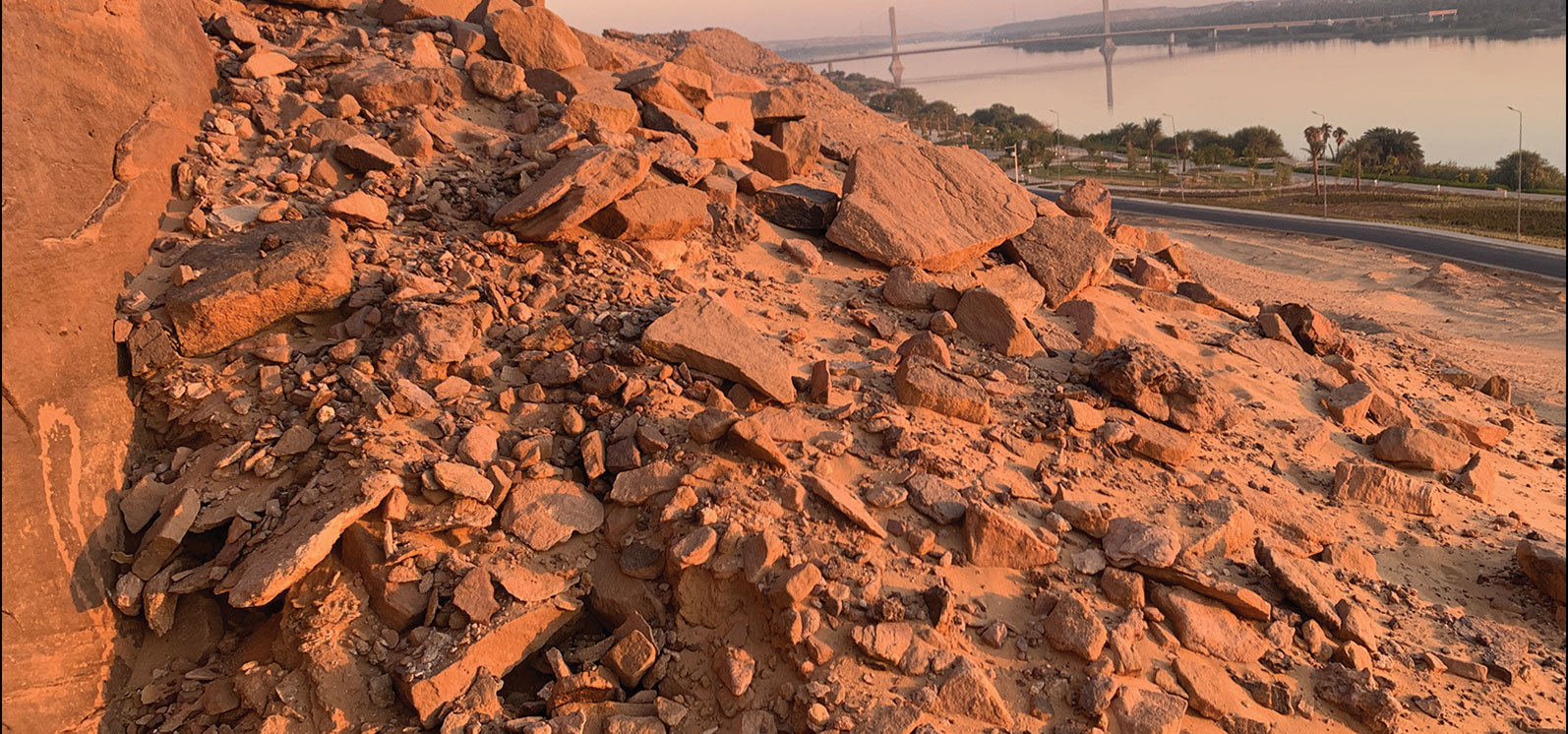 Rock art panel partially covered by rubble, Aswan, Egypt