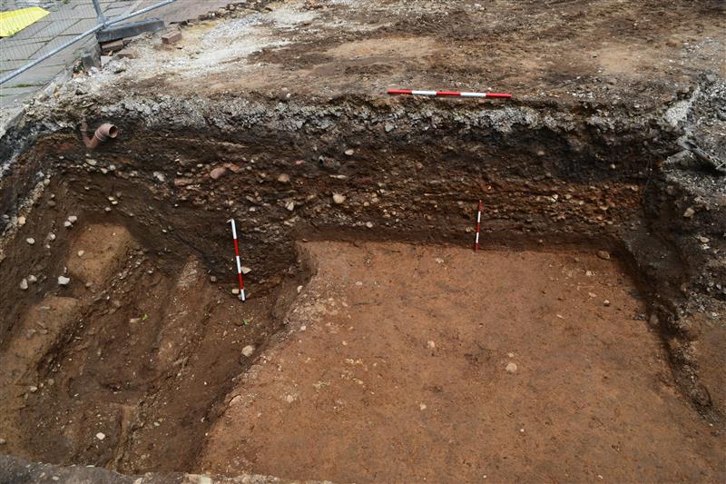 Section of Roman road in an excavation trench, Manchester, England