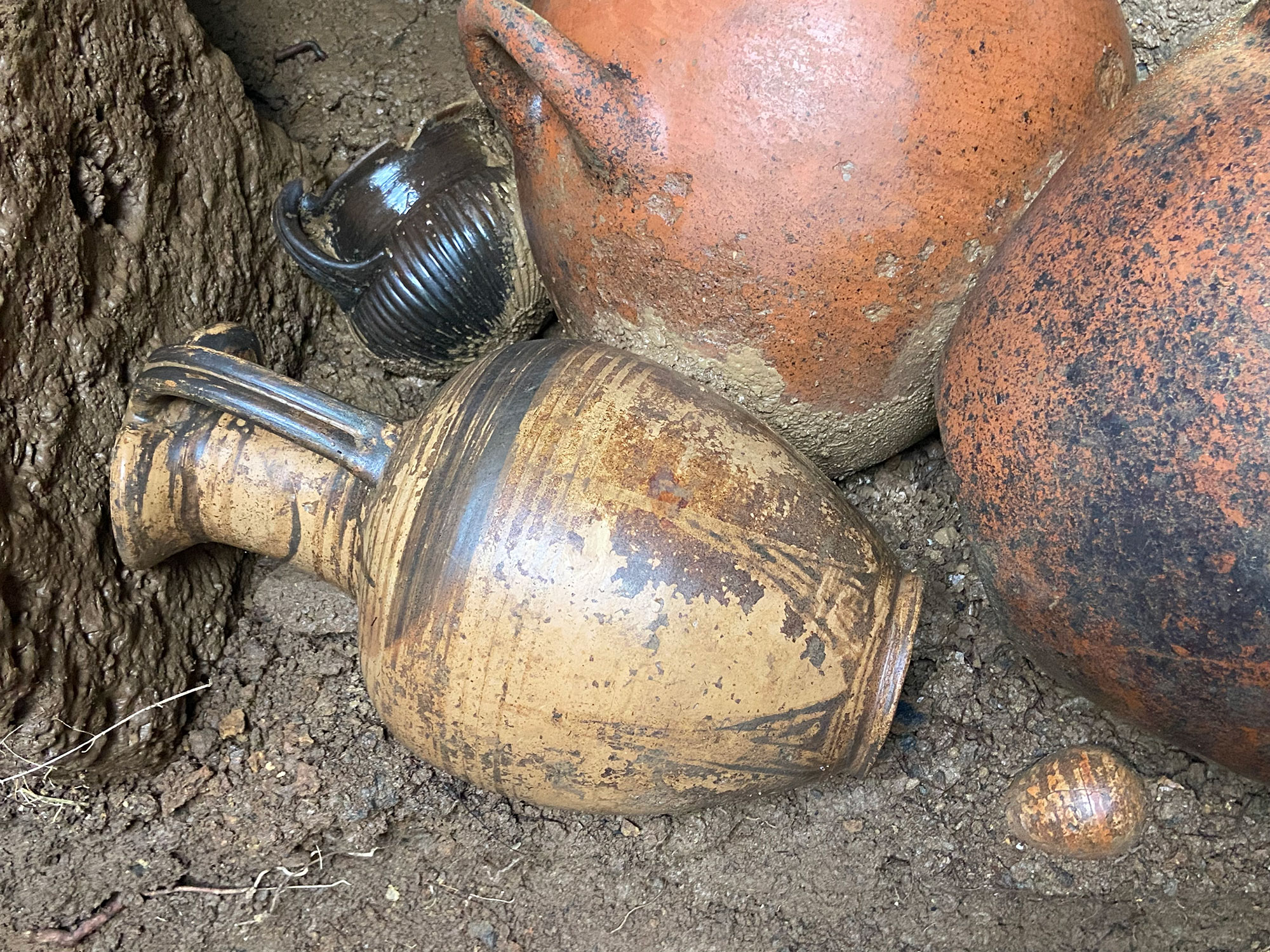 Intact pottery in Etruscan tomb, San Giuliano, Italy