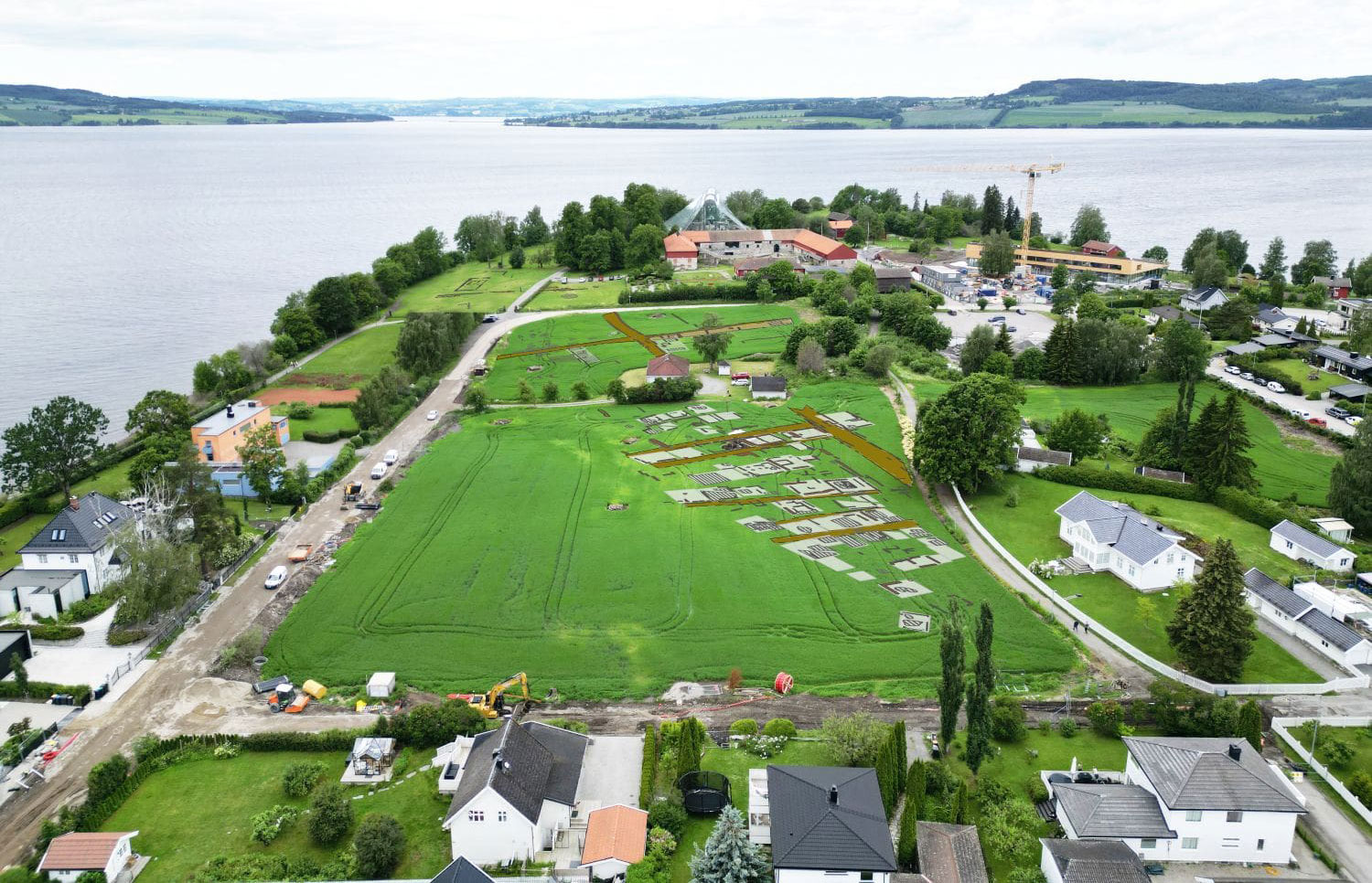 Aerial view and overlaid ground-penetrating radar imaging of the medieval town of Hamar, Domkirkeodden, Norway