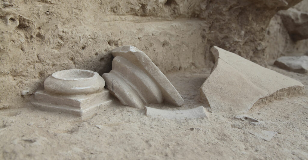 Portable altars in the shape of column bases shown in situ at Torbulok, Tajikistan