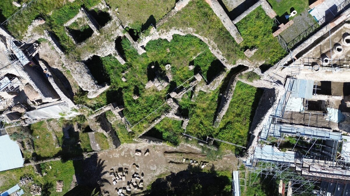 Aerial view of Insula Meridionalis in Pompeii, Italy, showing walls of the housing block