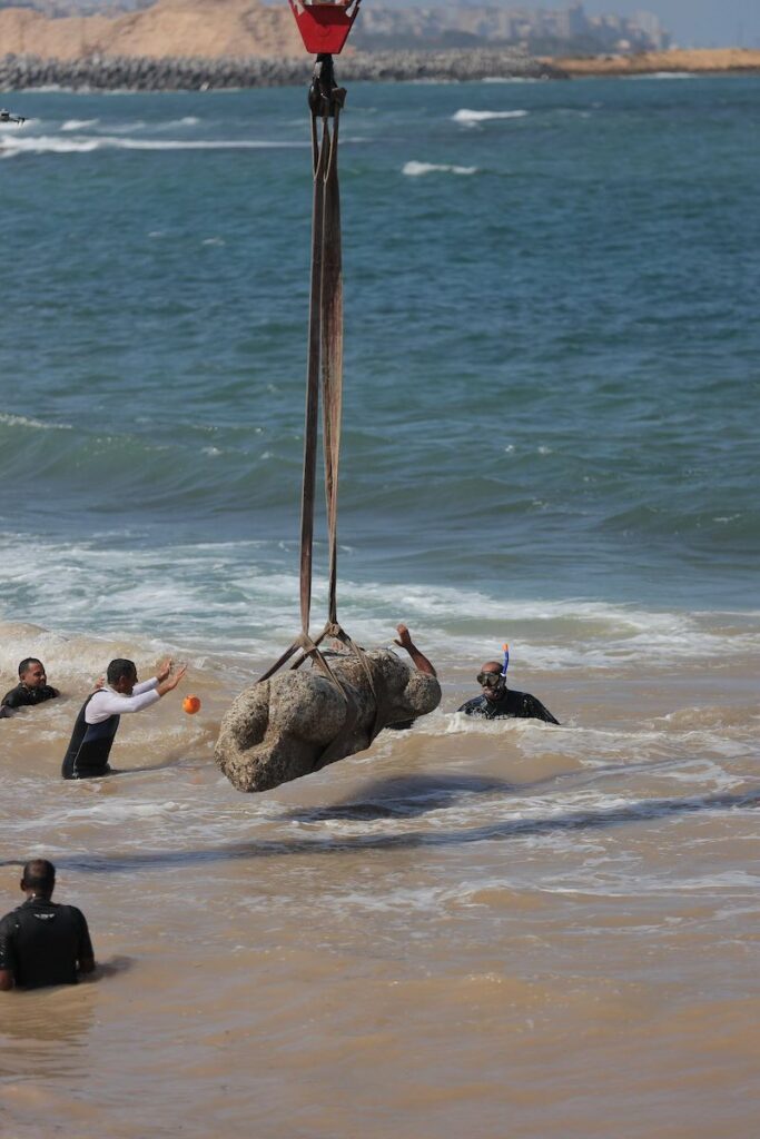 Divers raise the granite sphinx statue, Abu Qir, Egypt