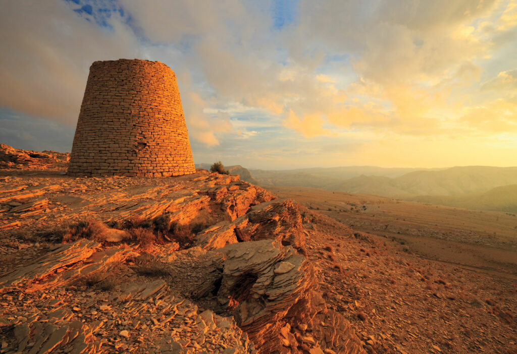 Conical stone tomb overlooking a desert landscape at the Umm an-Nar culture site of Shir, Oman