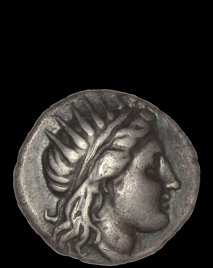 Coin showing Helios in profile wearing a radiate crown