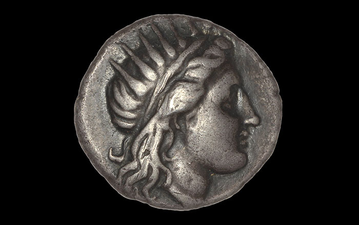 Coin showing Helios in profile wearing a radiate crown