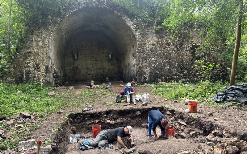 A team of archaeologists works at the site of a Colonial-era church amid the ruins of the former Maya town known as Hunacti in northern Yucatán, Mexico.