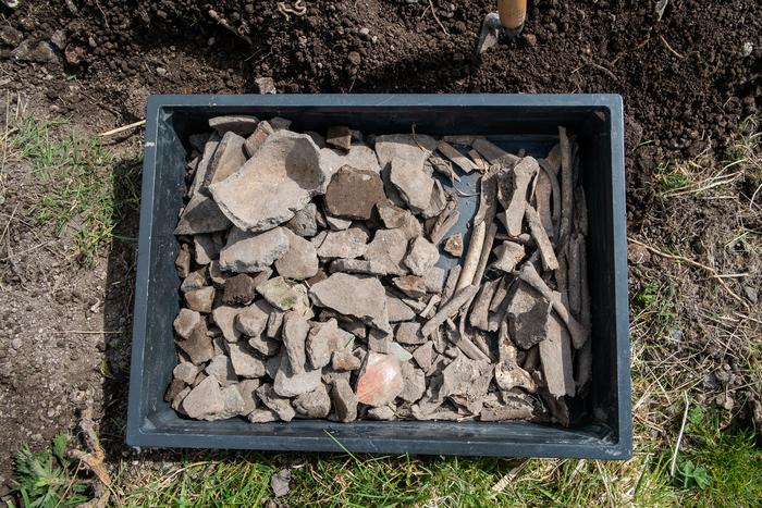Feasting debris of pottery and bone from East Chisenbury midden, Wiltshire, England
