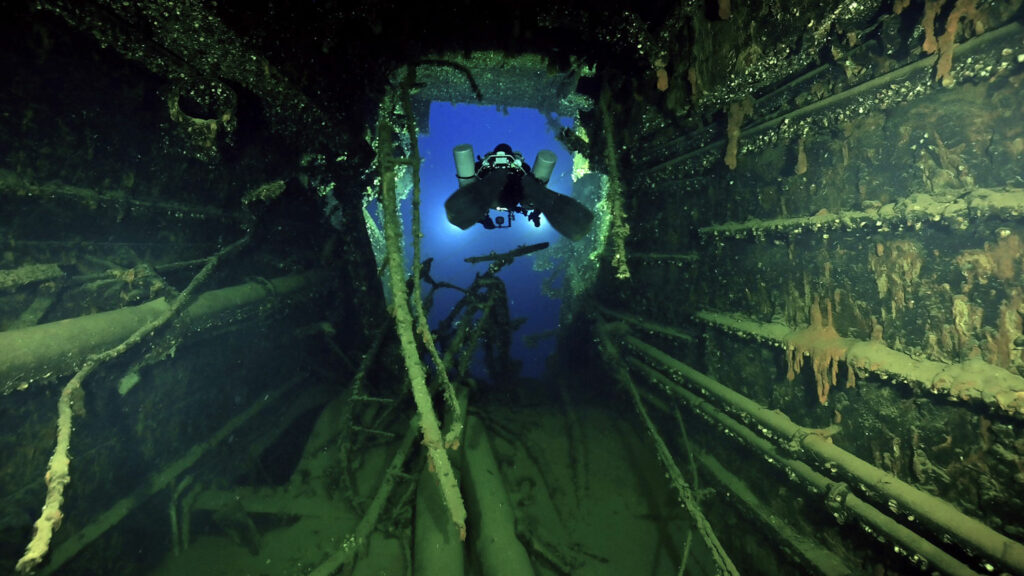 A diver explores the wreck of HMHS Britannic.