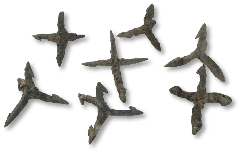 Iron spikes called crow's feet