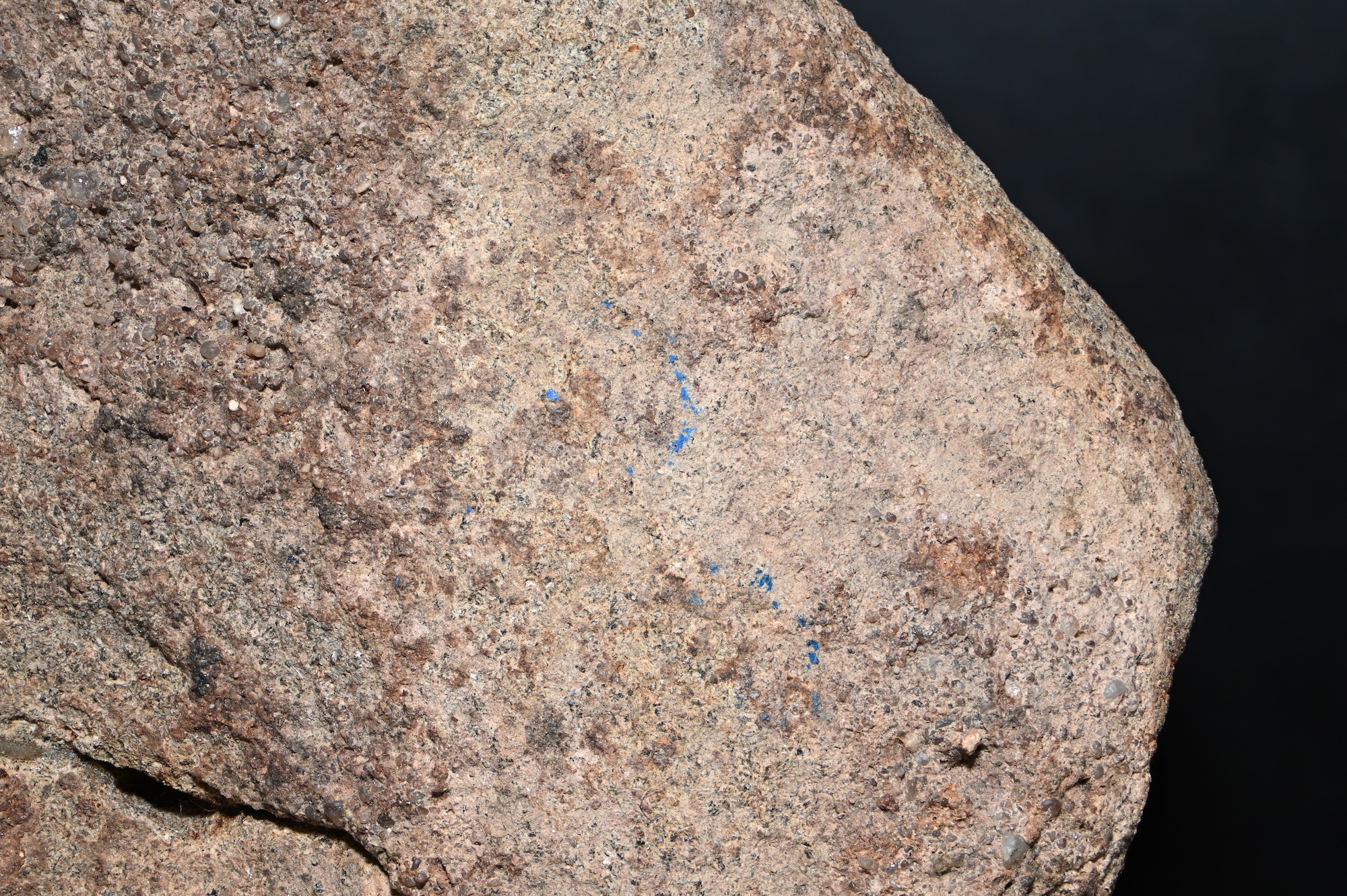 Blue pigment residue on stone artifact