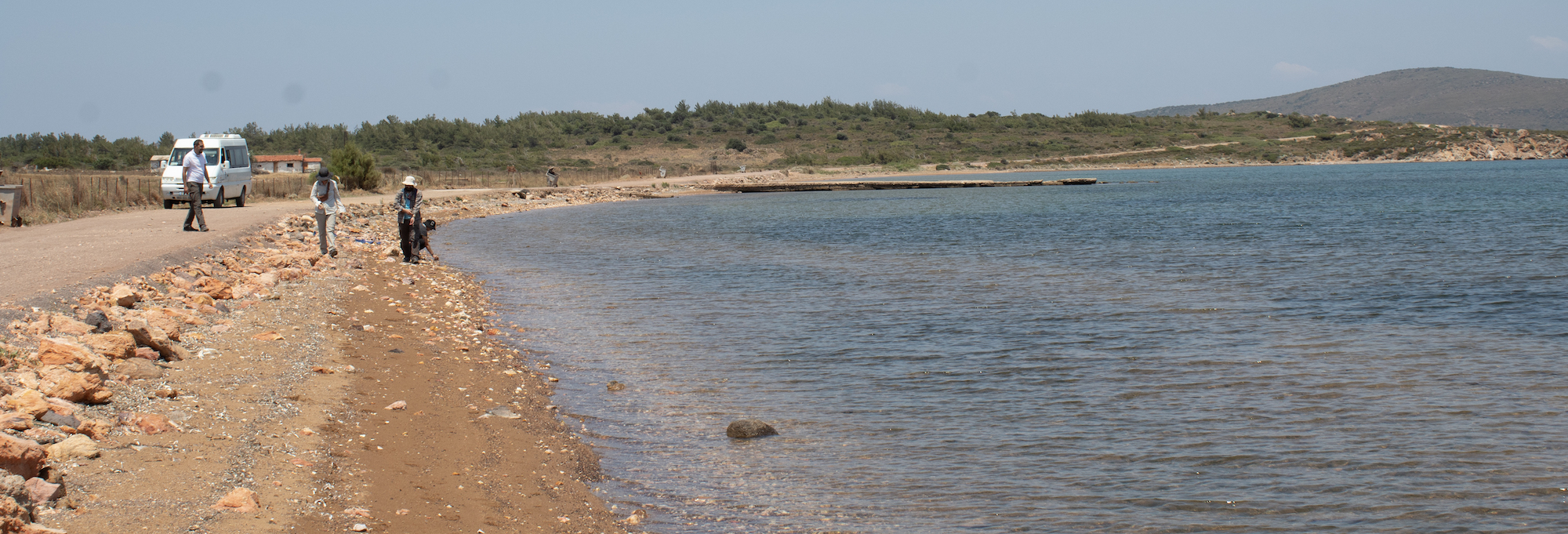 Archaeologists survey the coastline, Ayvalık, Turkey