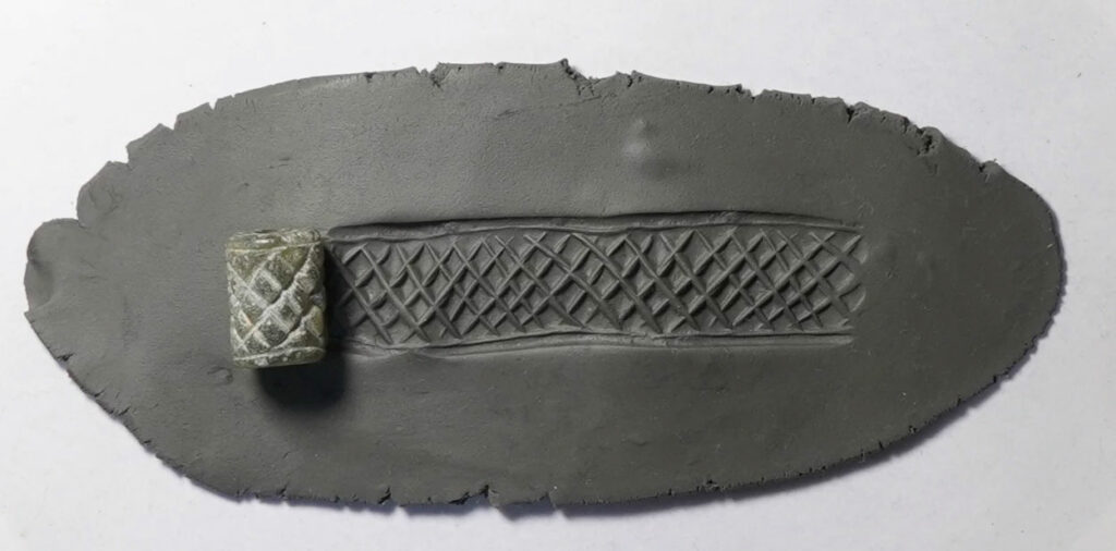 Uruk cylinder seal and its imprint