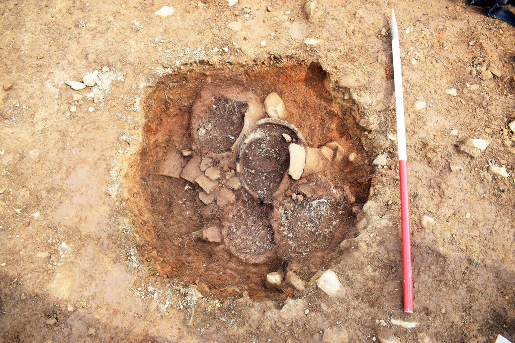 Pit with five burial urns uncovered at Twentyshilling Wind Farm, Sanquhar, Scotland