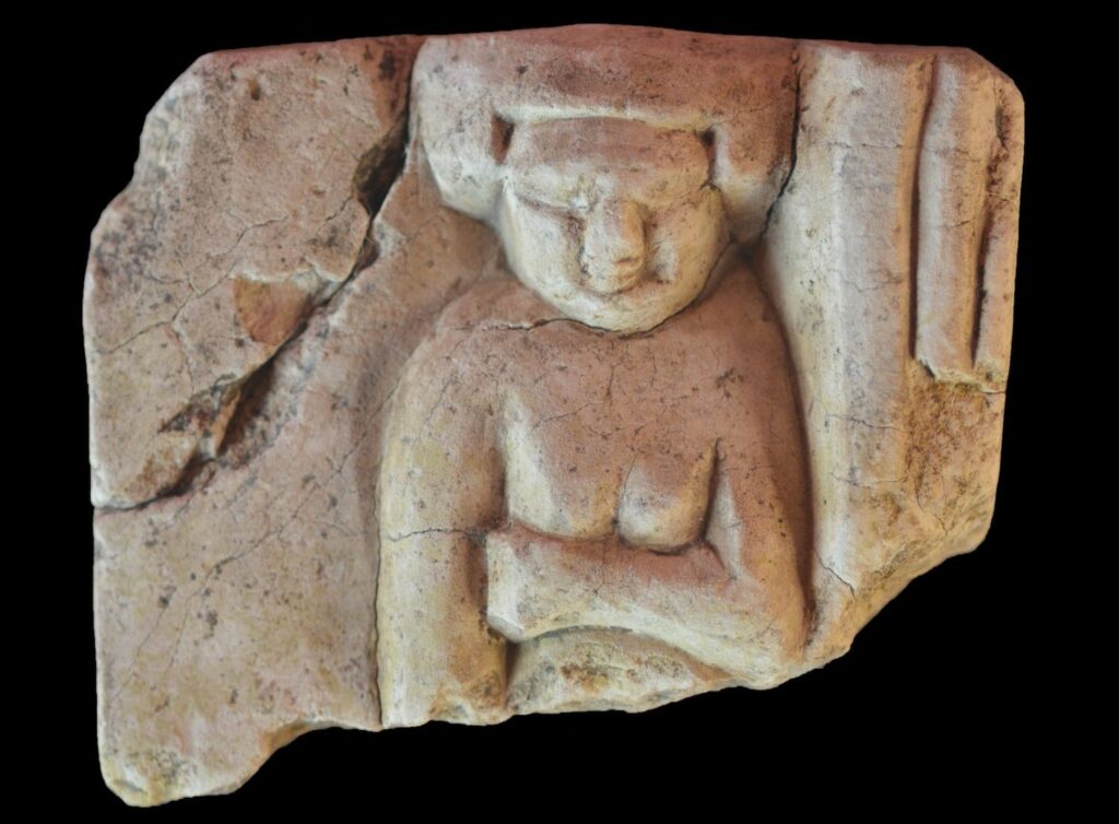 Limestone statue fragment