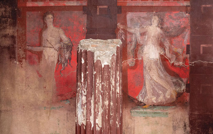Frescoed panels in the House of the Thiasus portray a satyr (left) and a woman (right)