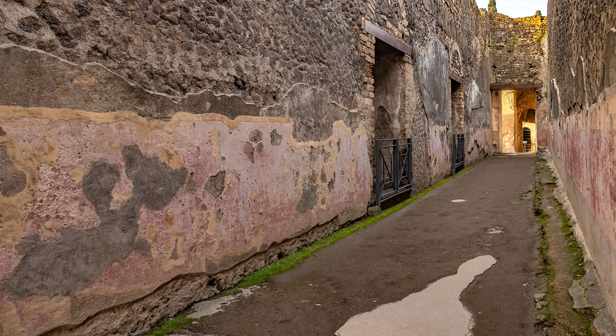 Graffiti on wall of theater corridor, Pompeii, Italy
