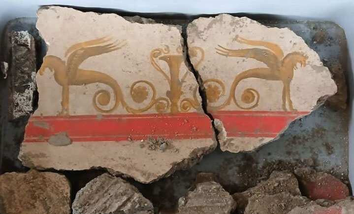 Fresco fragments depicting griffins