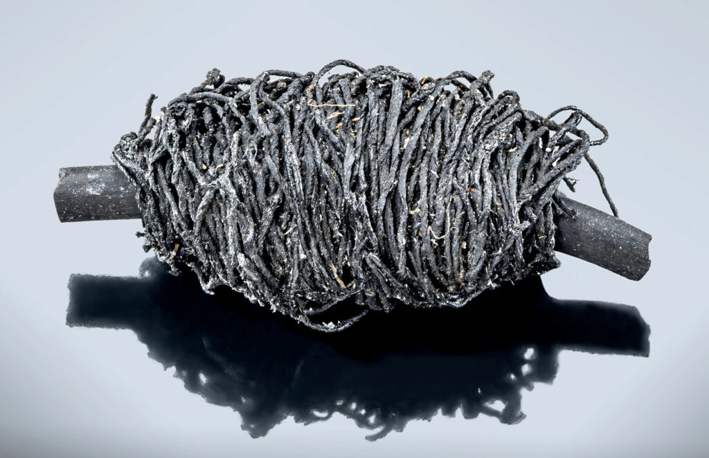 5,900-year-old ball of twine wrapped around a twig