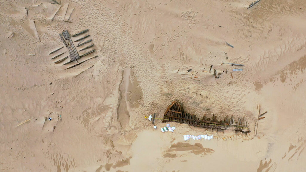 Aerial view of exposed shipwreck remnants, Sable Island National Park Reserve, Canada