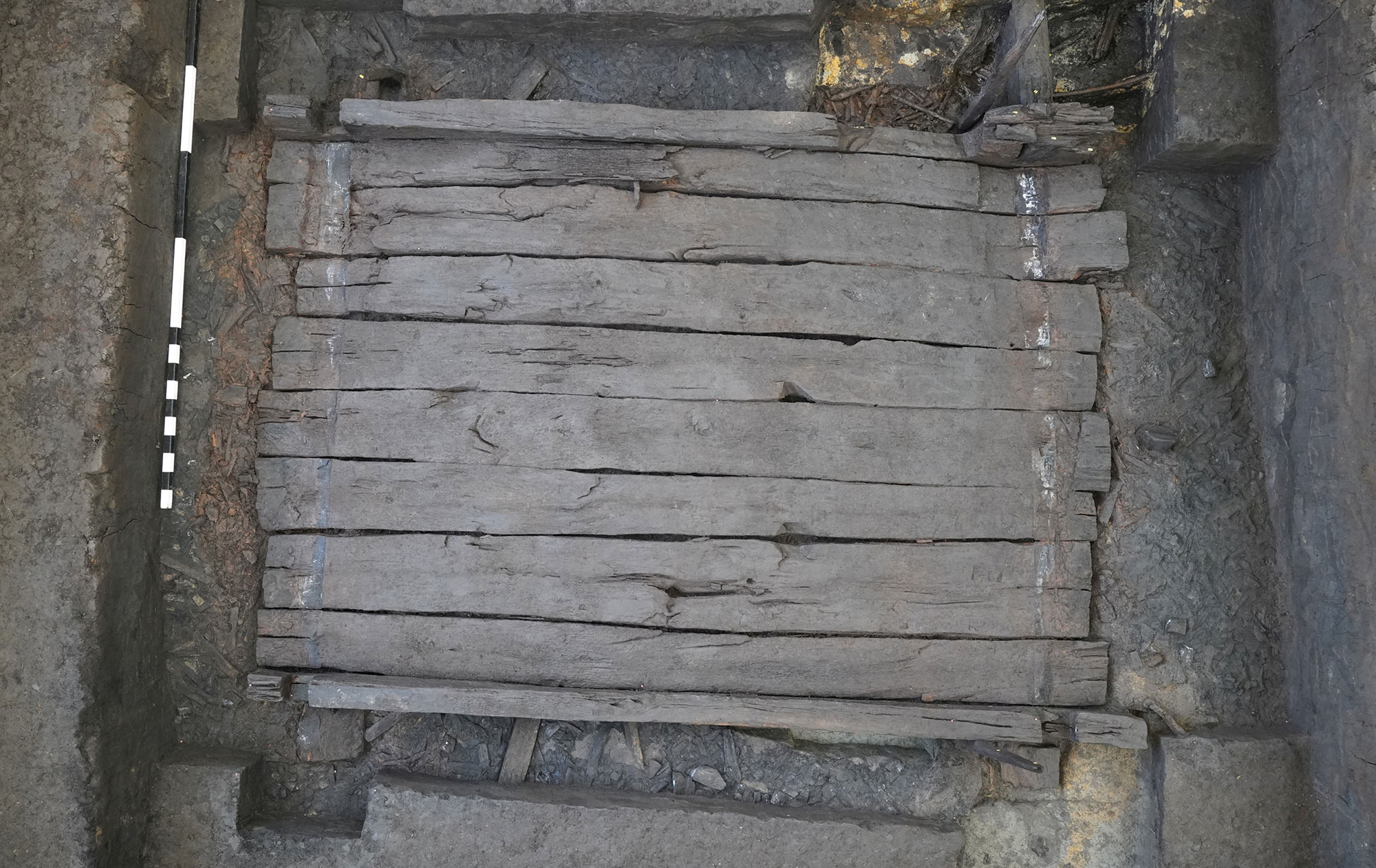 The floor of a Celtic burial chamber unearthed in Riedlingen, Germany, consists of planks resting on two joists.