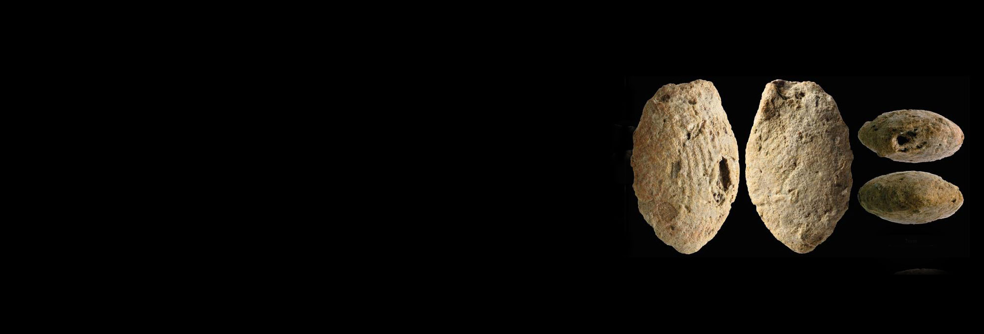 Natufian butterfly clay bead, colored red with ocher and marked with the fingerprints of the child who modeled it 12,000 years ago